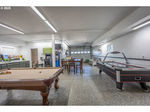 a room with table and chairs