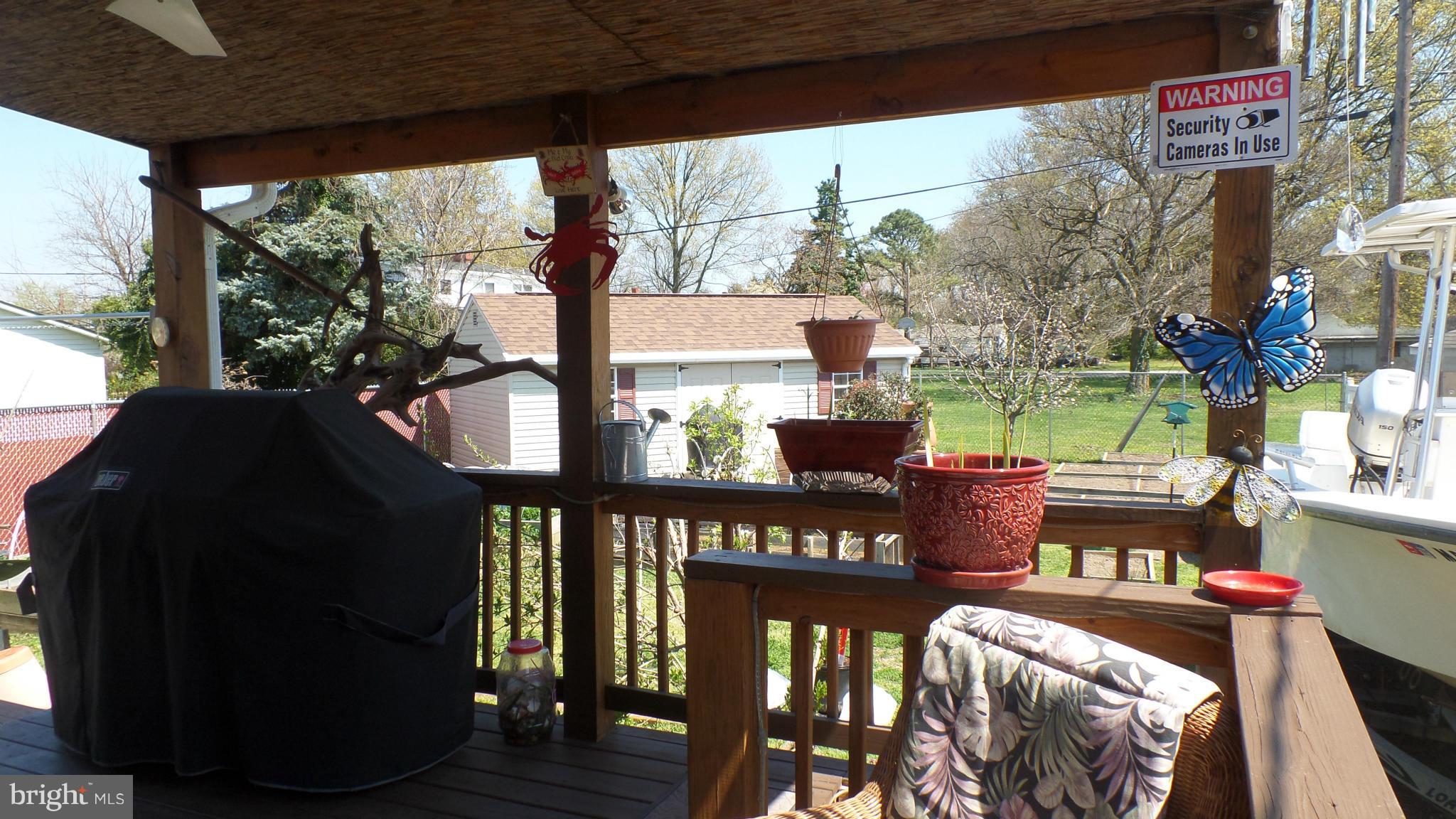 1703 Ranch Lane Baltimore, MD 21222 - Photo 26 of 30 Covered Double Level Deck with Ceiling Fan