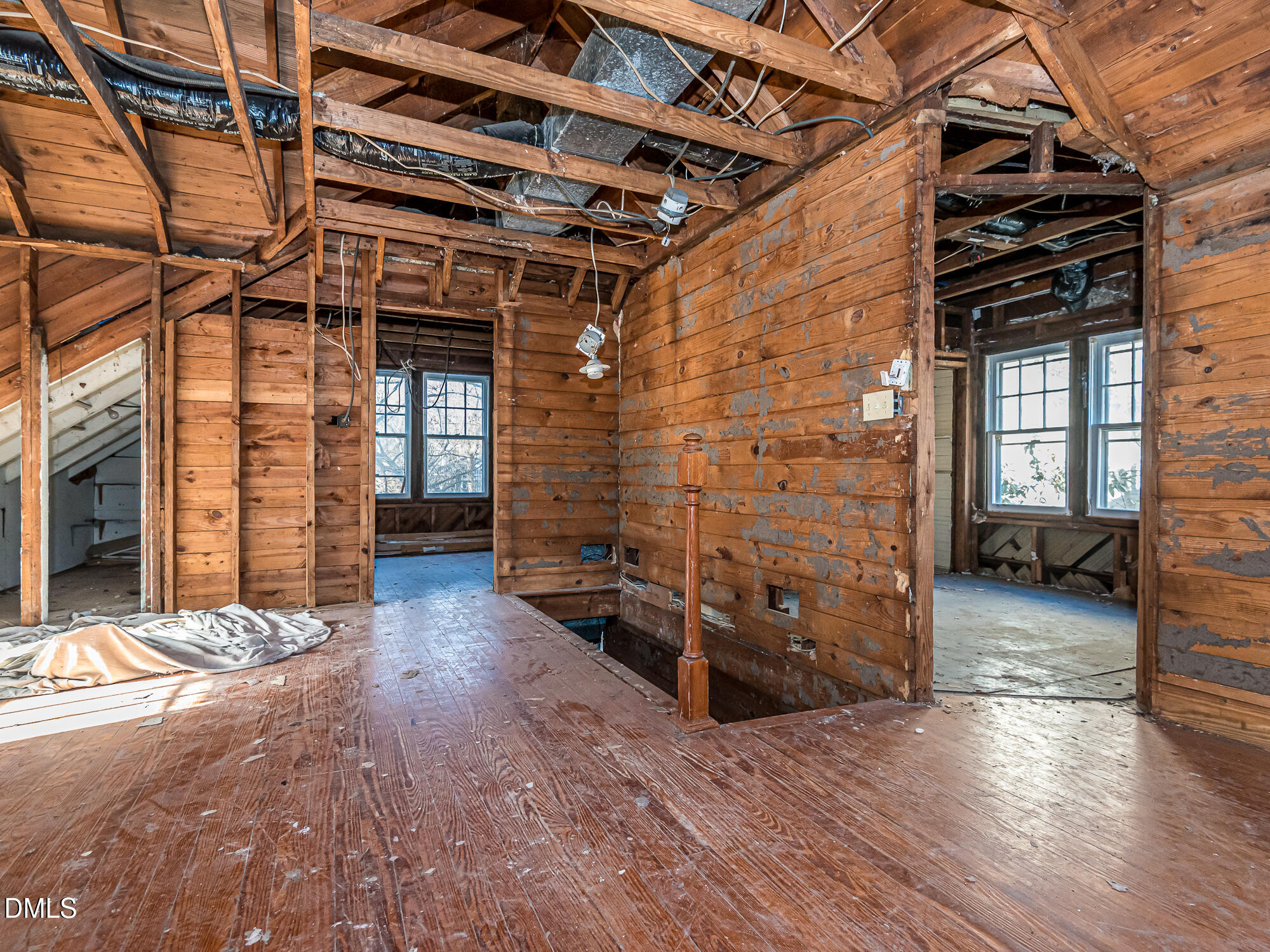 1825 White Oak Road Raleigh, NC 27608 - Photo 18 of 35 a view of a storage room with wooden floor