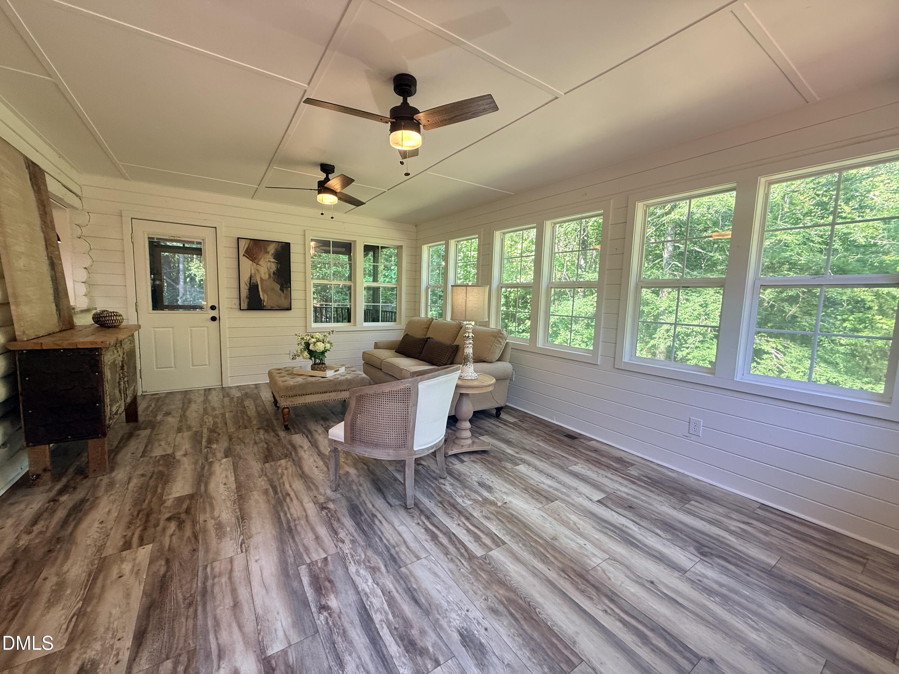 327 Shady Oak Road Roxboro, NC 27574 - Photo 19 of 62 a living room with furniture and a large window