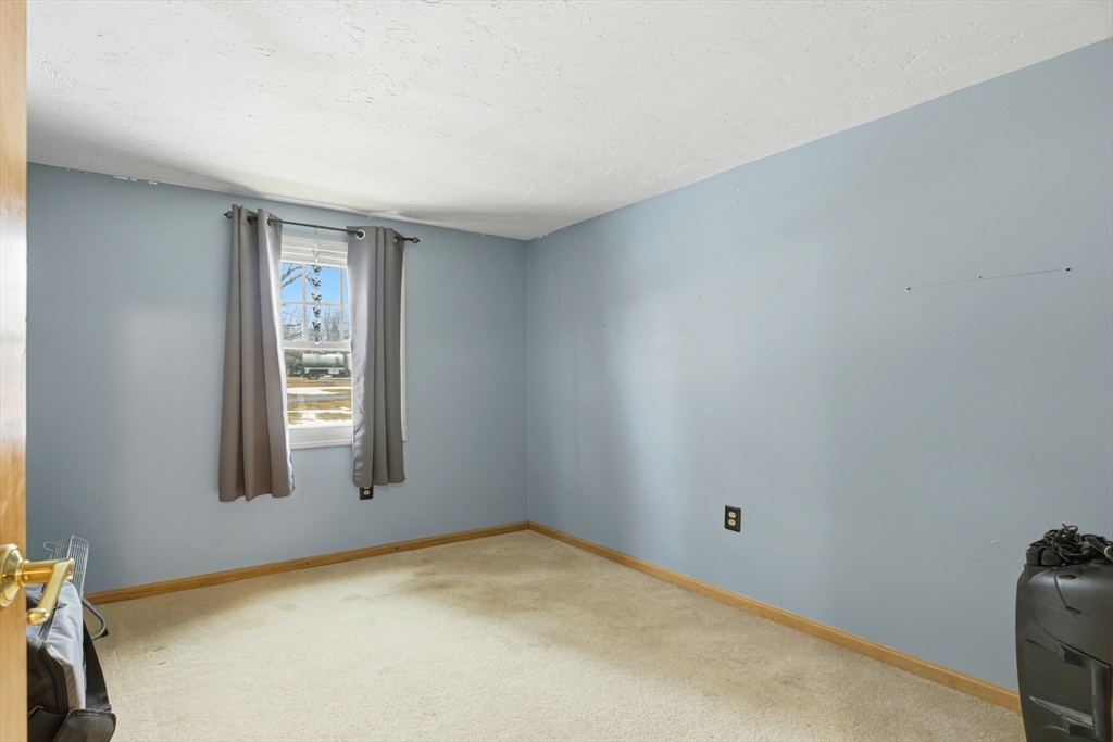 10 Wapping Road Kingston, MA 02364 - Photo 8 of 21 a view of empty room with windows