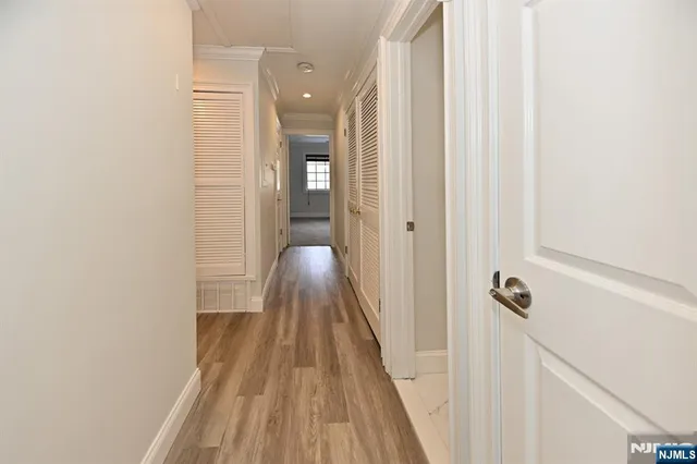 a view of a bathroom from the hallway