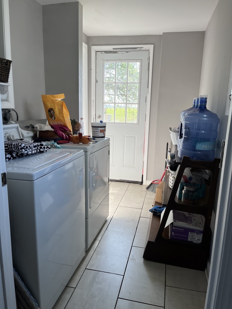 67 North 37th Road Mendota, IL 61342 - Photo 11 of 19 a room with storage and utility