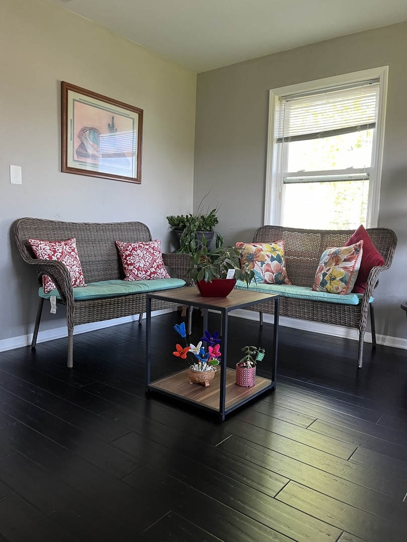 67 North 37th Road Mendota, IL 61342 - Photo 13 of 19 a living room with furniture and flowers