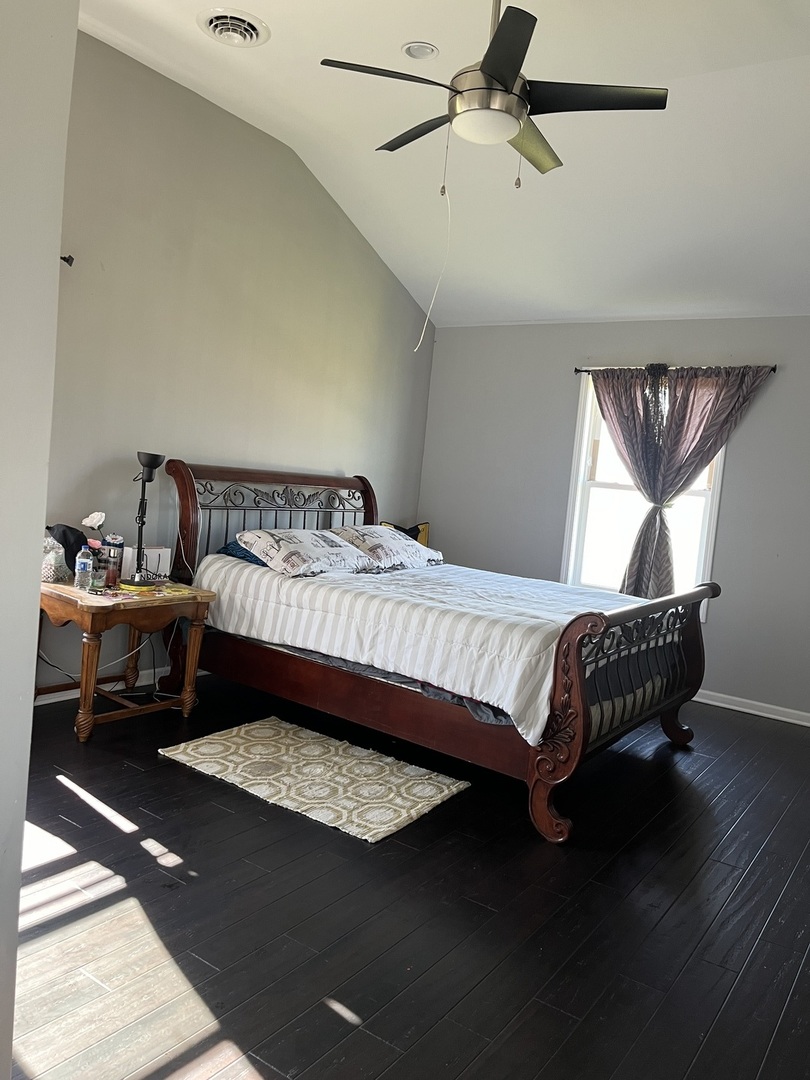67 North 37th Road Mendota, IL 61342 - Photo 15 of 19 a bedroom with a bed and wooden floor