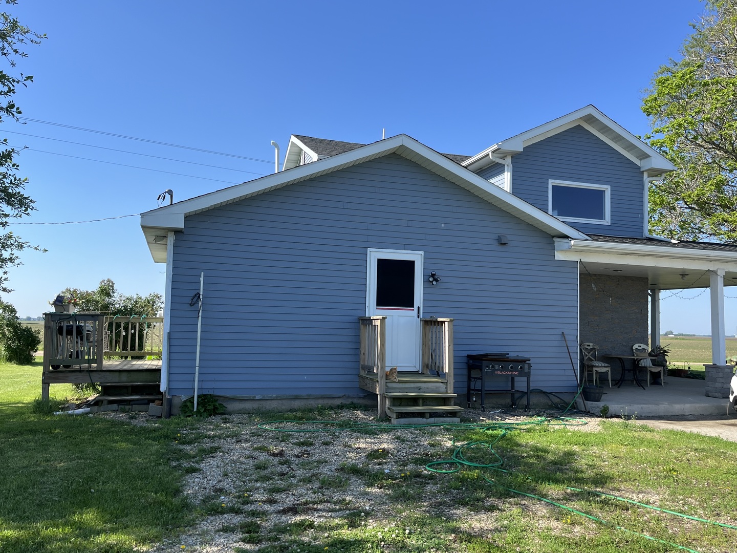 67 North 37th Road Mendota, IL 61342 - Photo 17 of 19 a view of a house with a yard