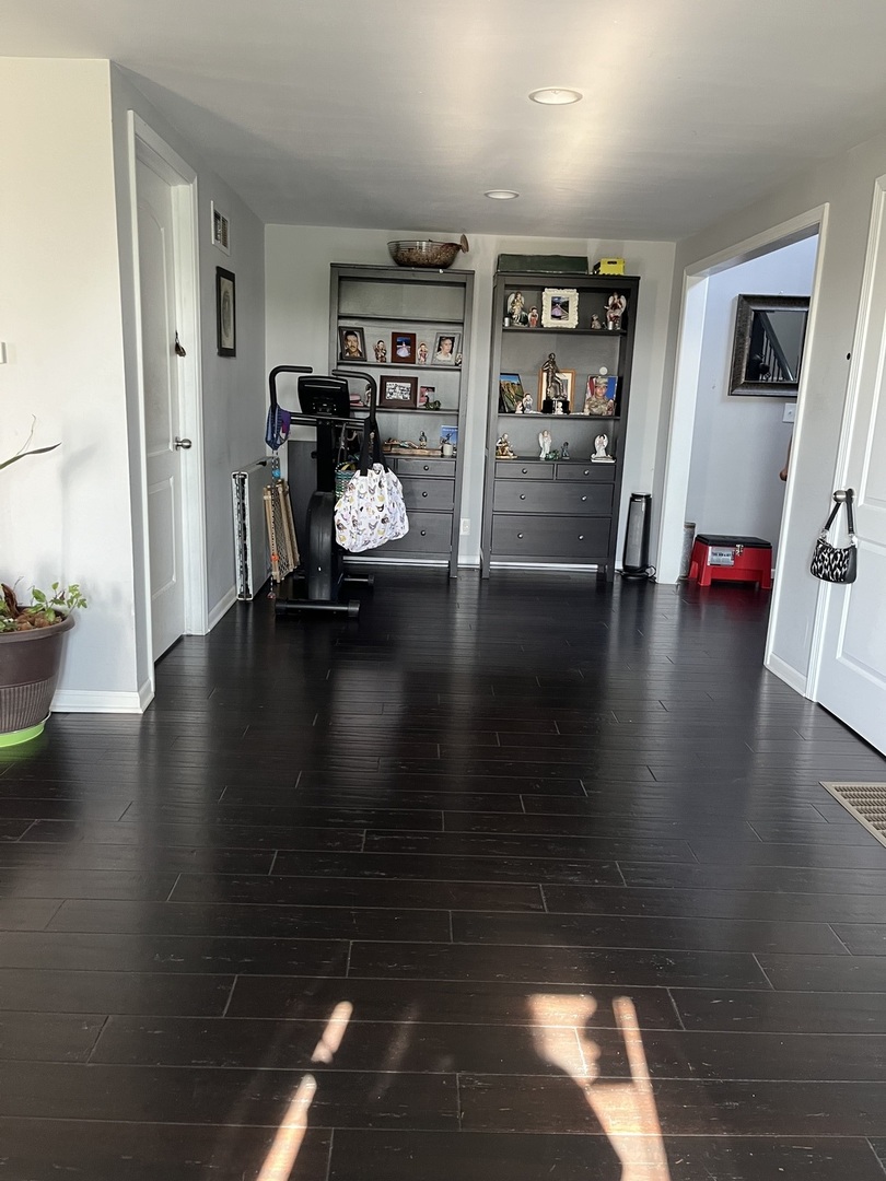 67 North 37th Road Mendota, IL 61342 - Photo 9 of 19 a view of a workspace with furniture and entryway