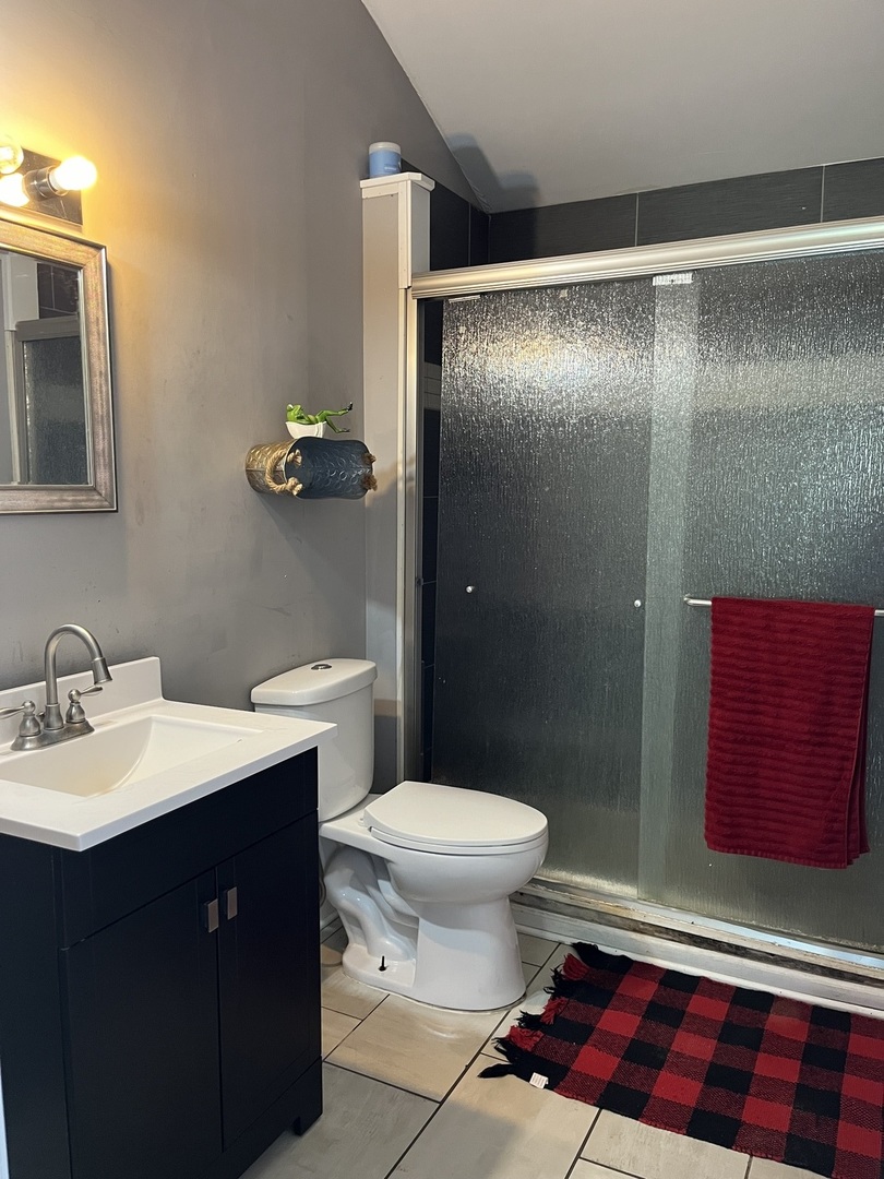 67 North 37th Road Mendota, IL 61342 - Photo 10 of 19 a bathroom with a sink toilet and shower