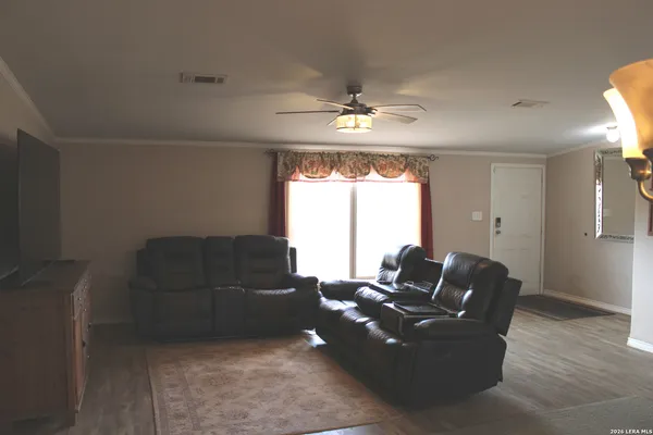 a living room with furniture and a window