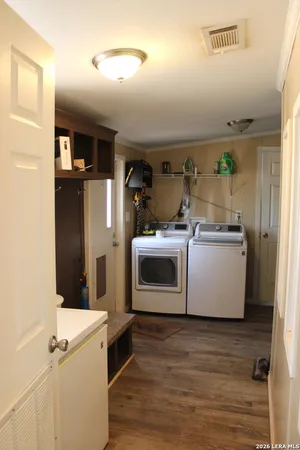 a utility room with washer and dryer