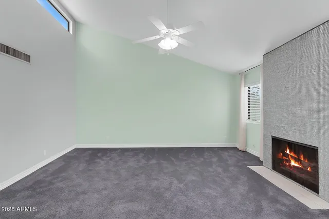 a bathroom with a shower toilet and sink