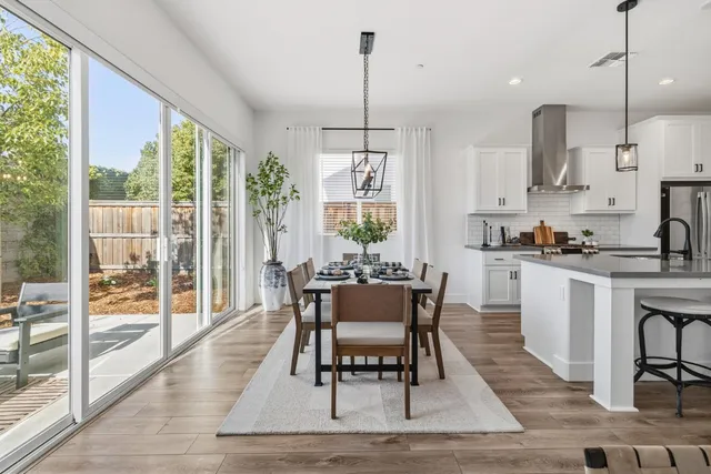 a bathroom with a sink double vanity and a mirror