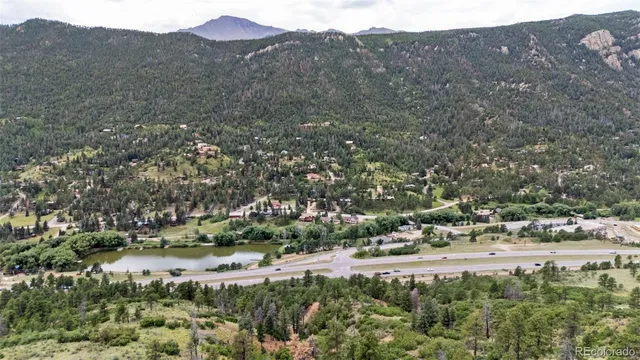 a view of lake with mountain