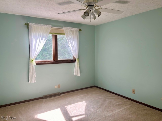 3422 Southern Road Richfield, OH 44286 - Photo 29 of 42 bedroom featuring carpet floors, a textured ceiling, and ceiling fan