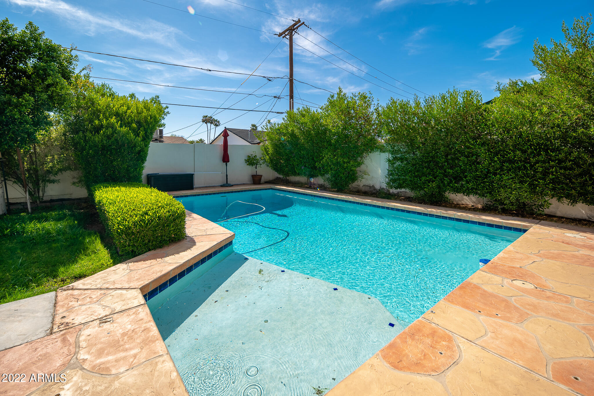 3864 North 50th Street Phoenix, AZ 85018 - Photo 2 of 15 a view of a backyard with a garden