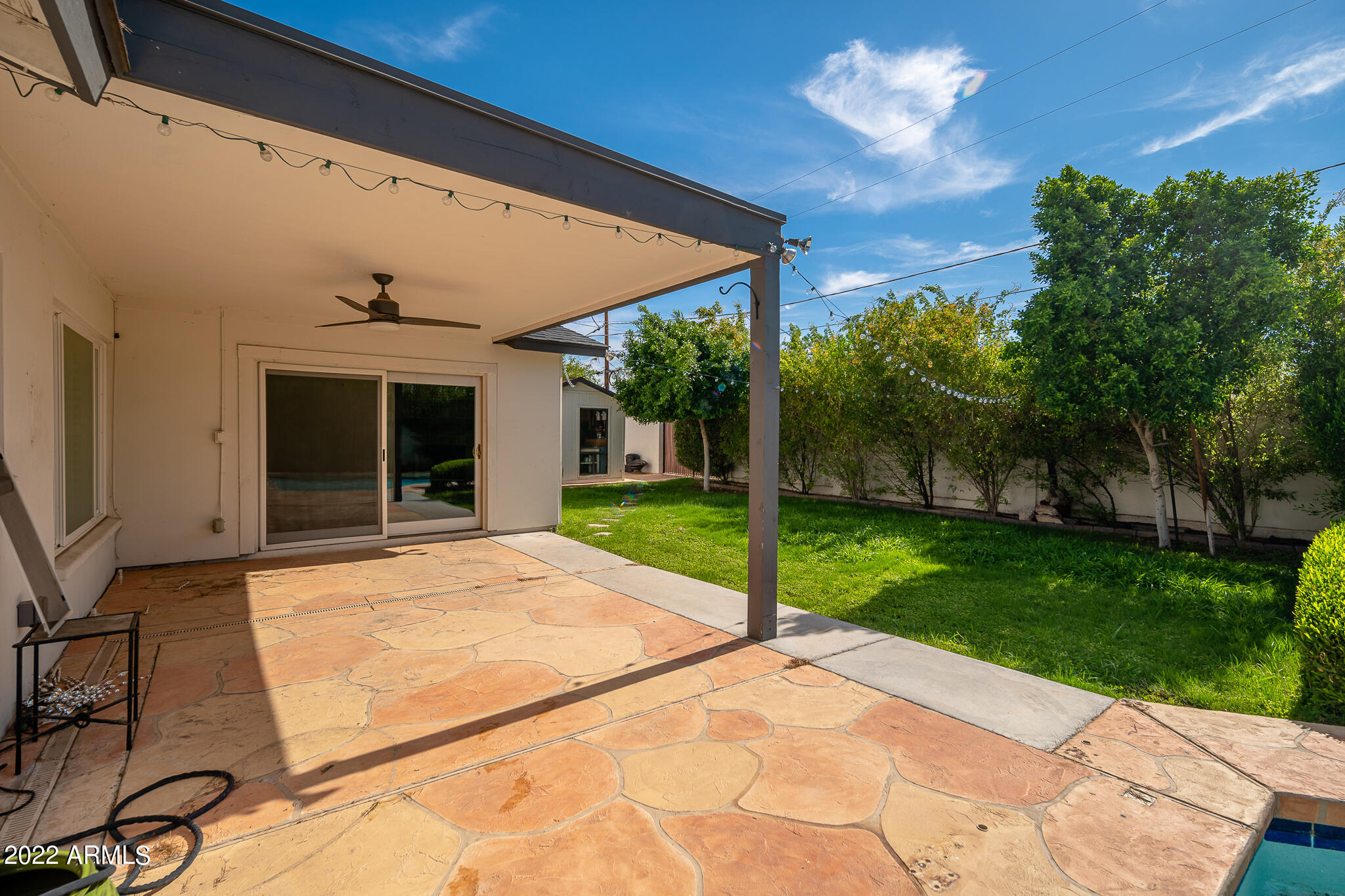 3864 North 50th Street Phoenix, AZ 85018 - Photo 5 of 15 a view of an house with backyard and porch