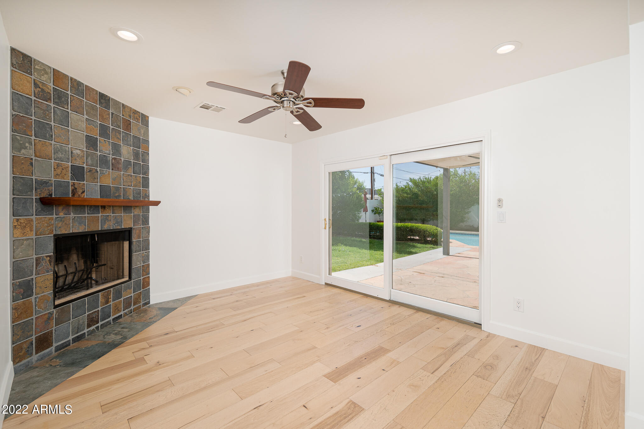 3864 North 50th Street Phoenix, AZ 85018 - Photo 8 of 15 a view of empty room with floor to ceiling window
