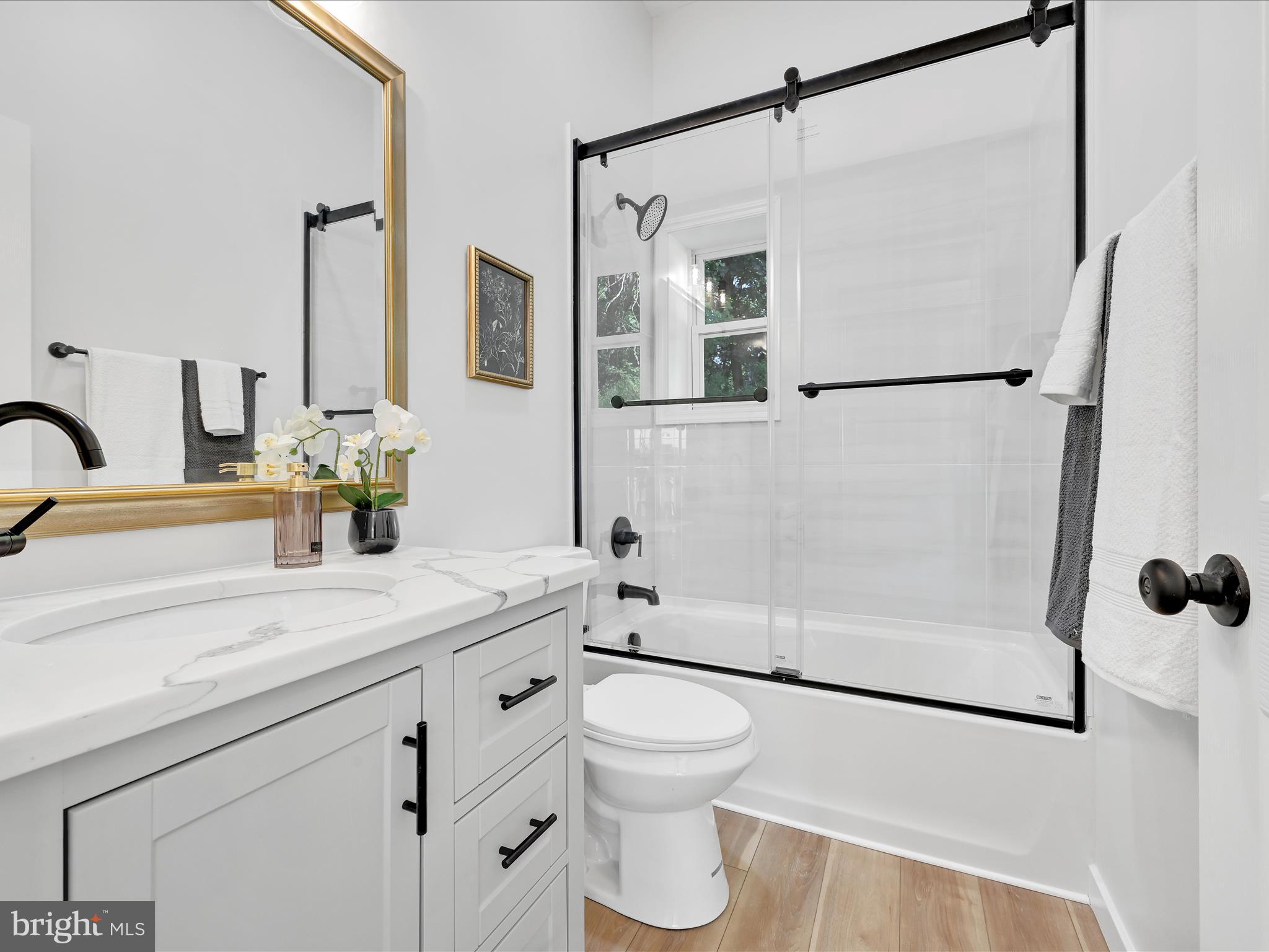 1056 West Leesport Road Leesport, PA 19533 - Photo 12 of 30 a bathroom with a sink toilet and shower