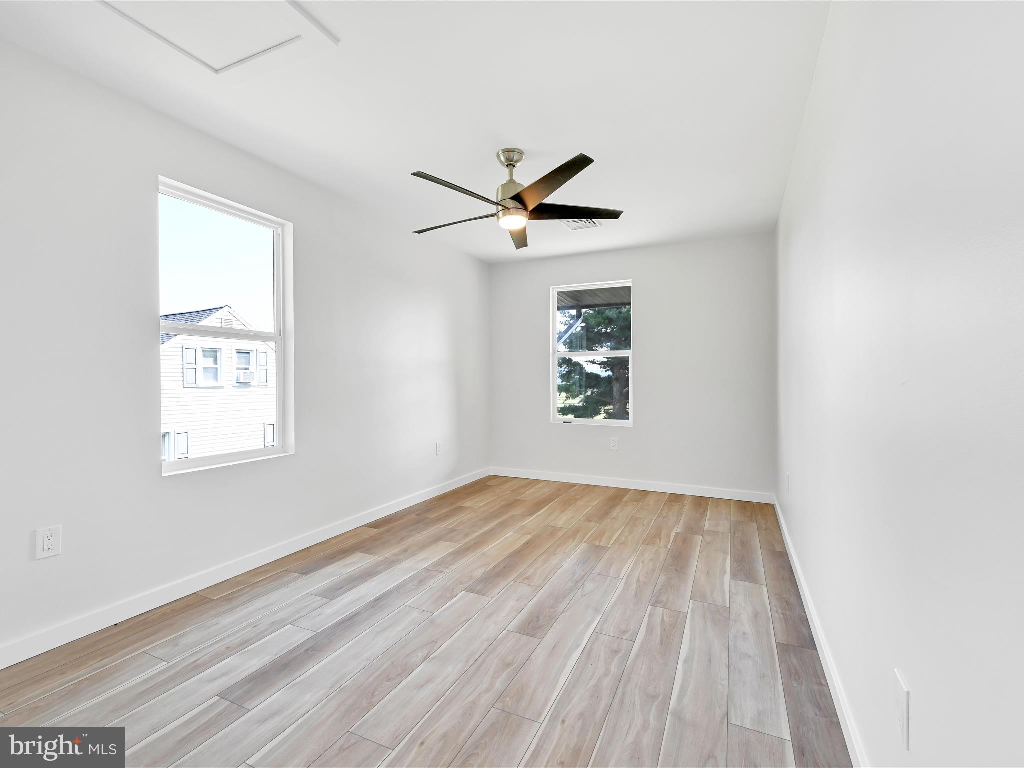 1056 West Leesport Road Leesport, PA 19533 - Photo 19 of 30 an empty room with windows and fan
