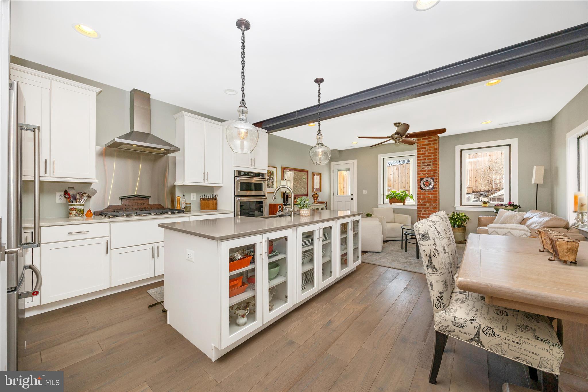 8 1/2 West 5th Street Frederick, MD 21701 - Photo 16 of 62 a large white kitchen with stainless steel appliances