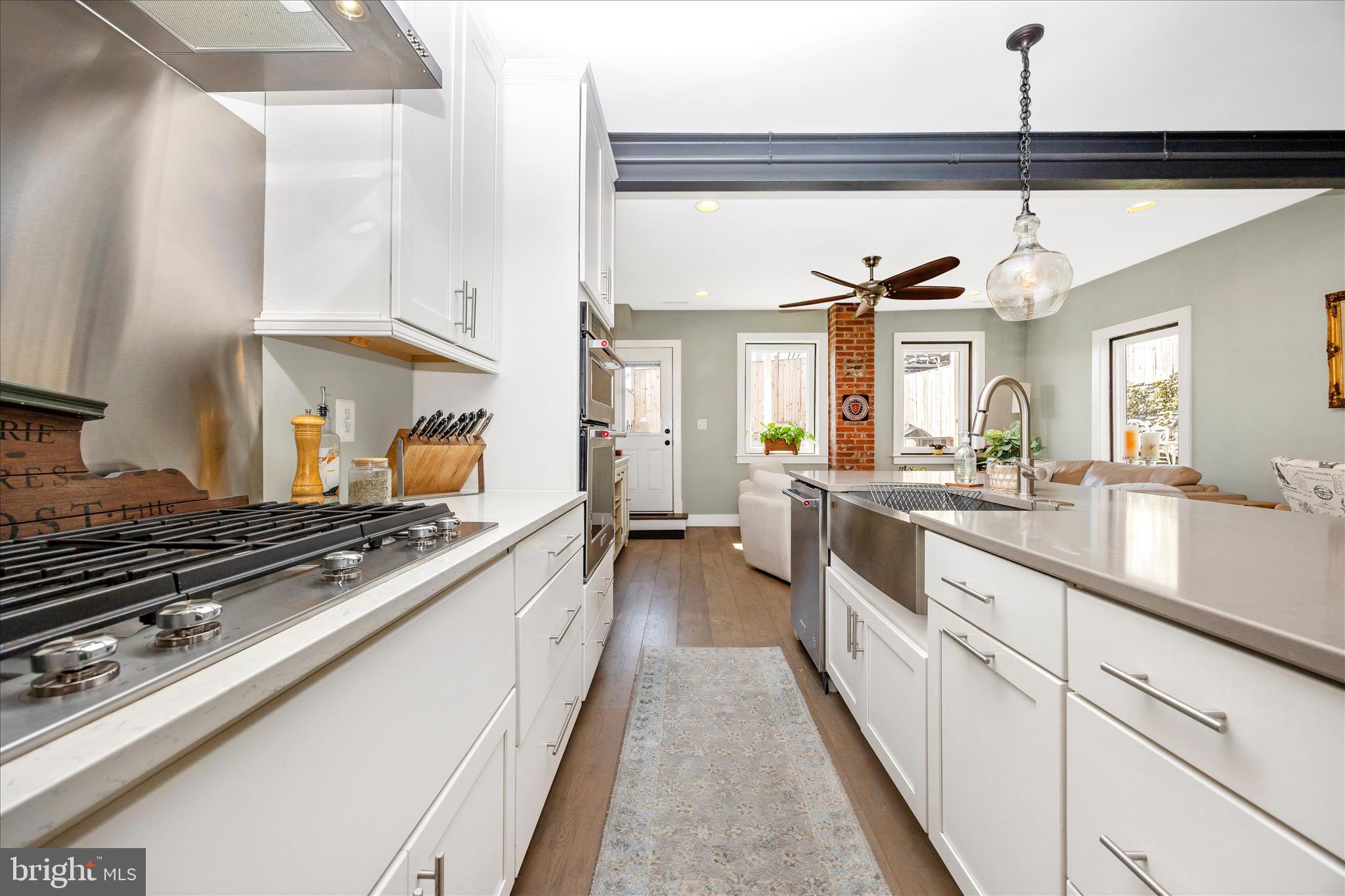 8 1/2 West 5th Street Frederick, MD 21701 - Photo 20 of 62 a kitchen with counter top space a sink and appliances