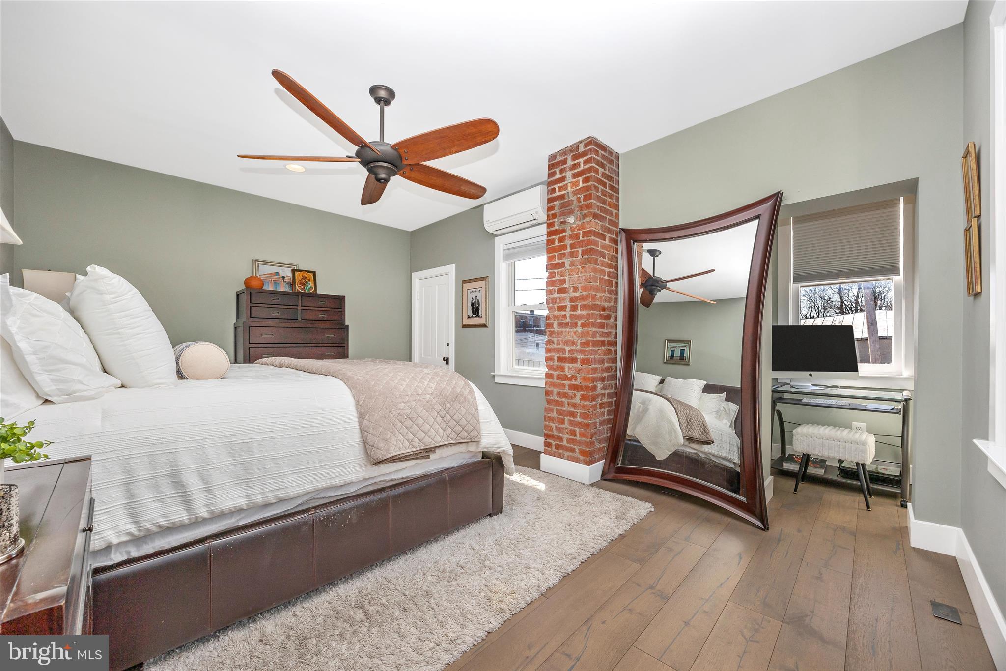 8 1/2 West 5th Street Frederick, MD 21701 - Photo 31 of 62 a spacious bedroom with a bed and window