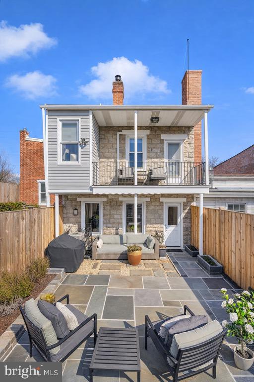 8 1/2 West 5th Street Frederick, MD 21701 - Photo 45 of 62 a front view of a house with sitting space and seating space
