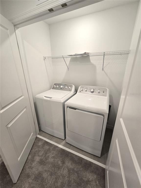 3575 Mayfair Street Kissimmee, FL 34758 - Photo 13 of 34 a utility room with dryer and washer