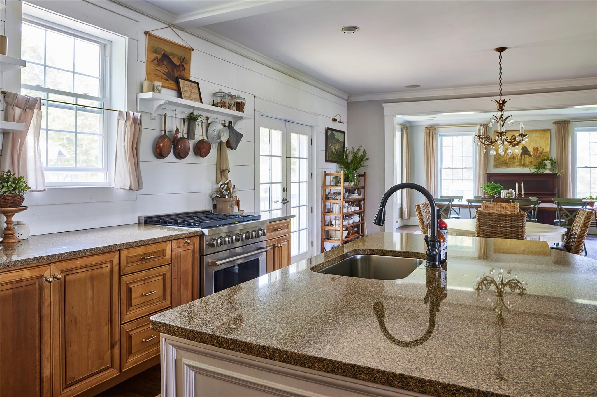 382 Benton Hollow Road Neversink, NY 12765 - Photo 12 of 50 a kitchen with a stove a sink and cabinets