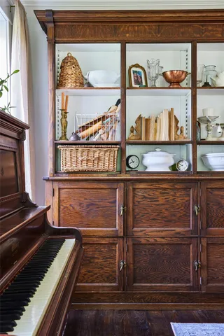 a spacious bathroom with a tub sink and mirror