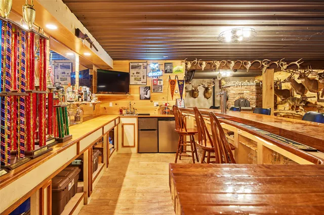 a stove top oven sitting inside of a kitchen