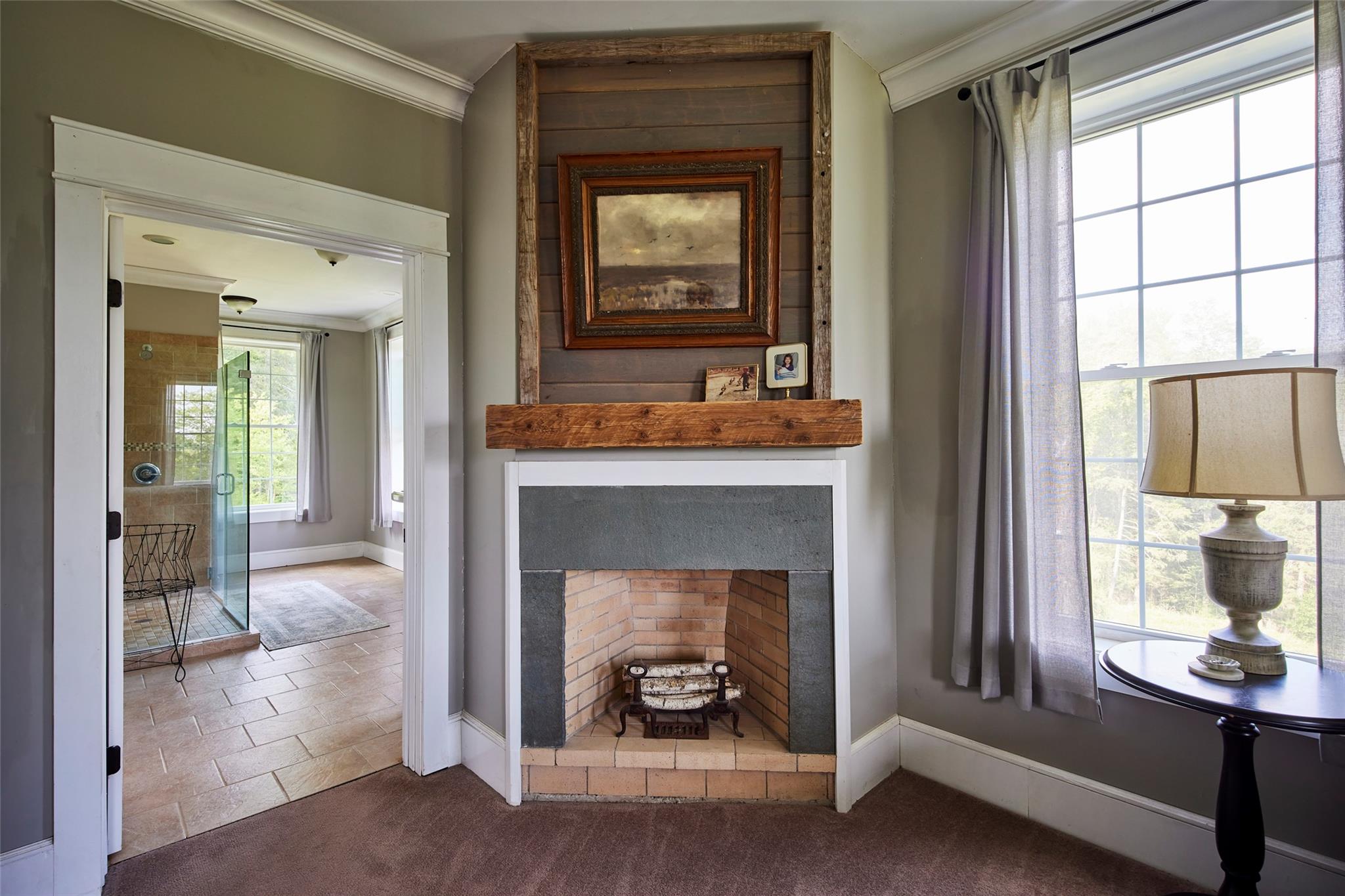 382 Benton Hollow Road Neversink, NY 12765 - Photo 29 of 50 a living room with a fireplace and a window