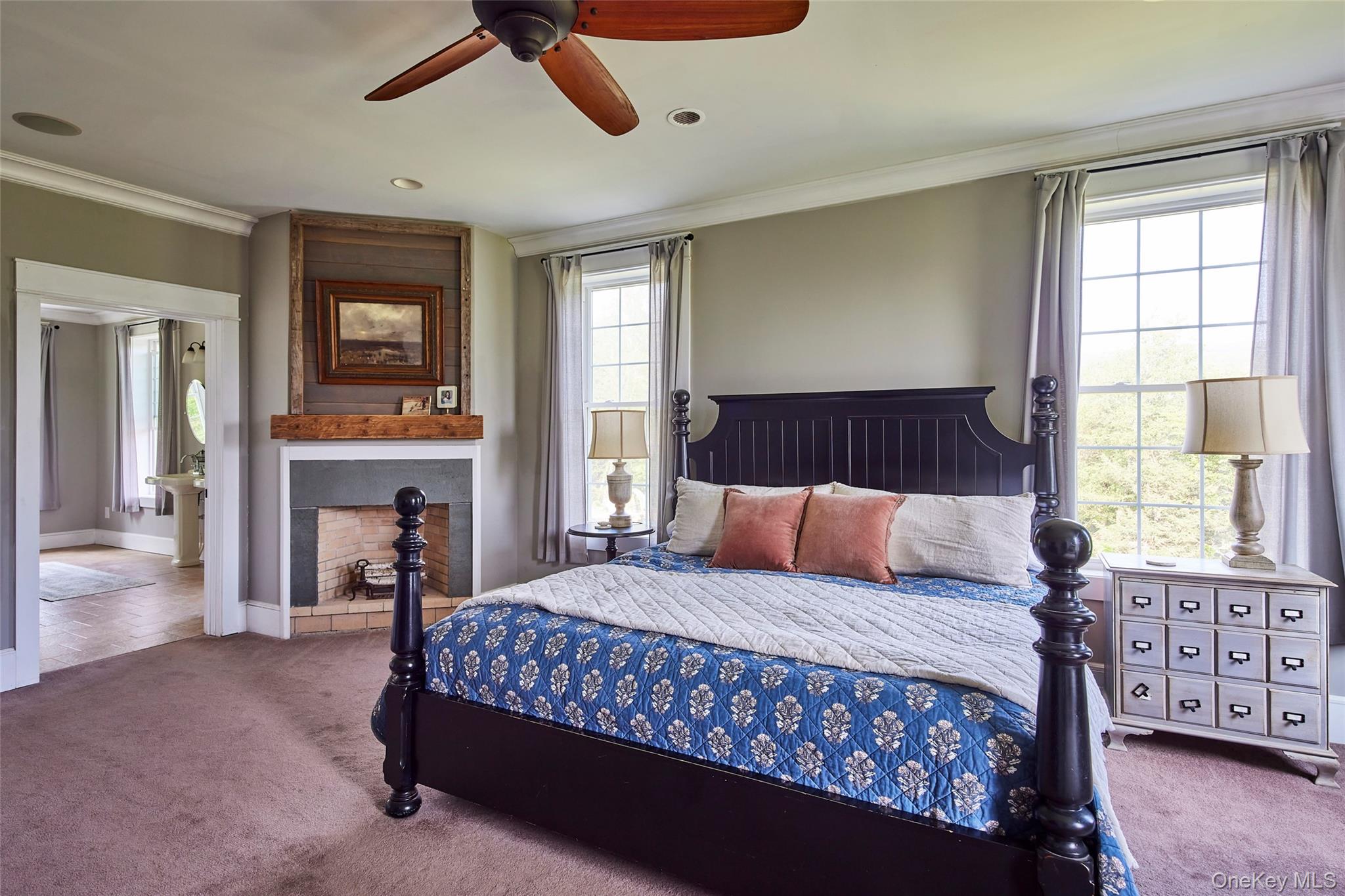 382 Benton Hollow Road Neversink, NY 12765 - Photo 30 of 48 a bedroom with a large bed and a chandelier