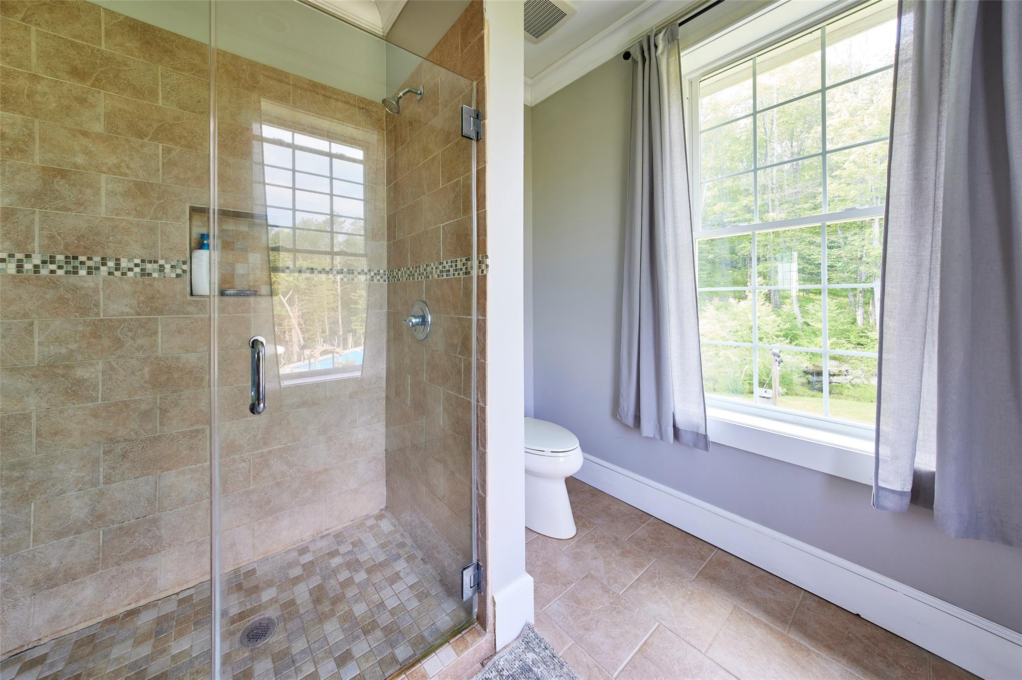 382 Benton Hollow Road Neversink, NY 12765 - Photo 32 of 50 a bathroom with a toilet sink and shower
