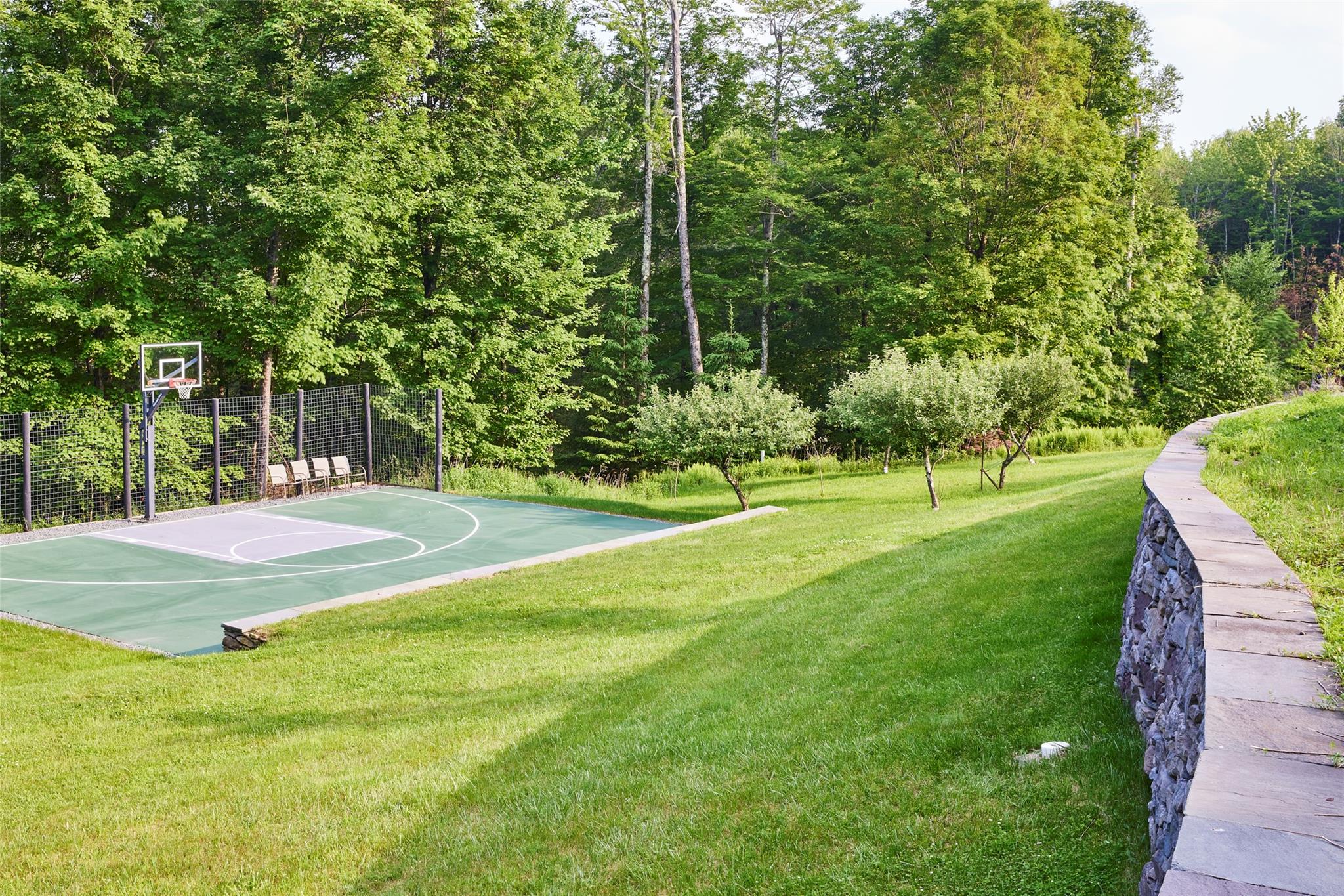 382 Benton Hollow Road Neversink, NY 12765 - Photo 40 of 50 a view of a playground with basketball court
