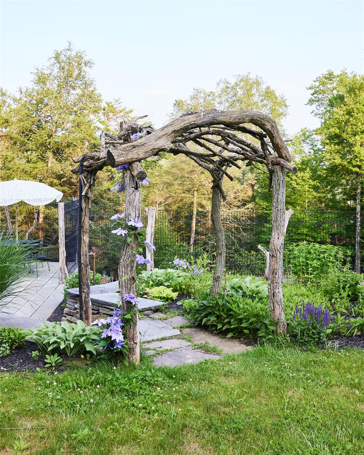 382 Benton Hollow Road Neversink, NY 12765 - Photo 50 of 50 a view of a chair and tables in the garden