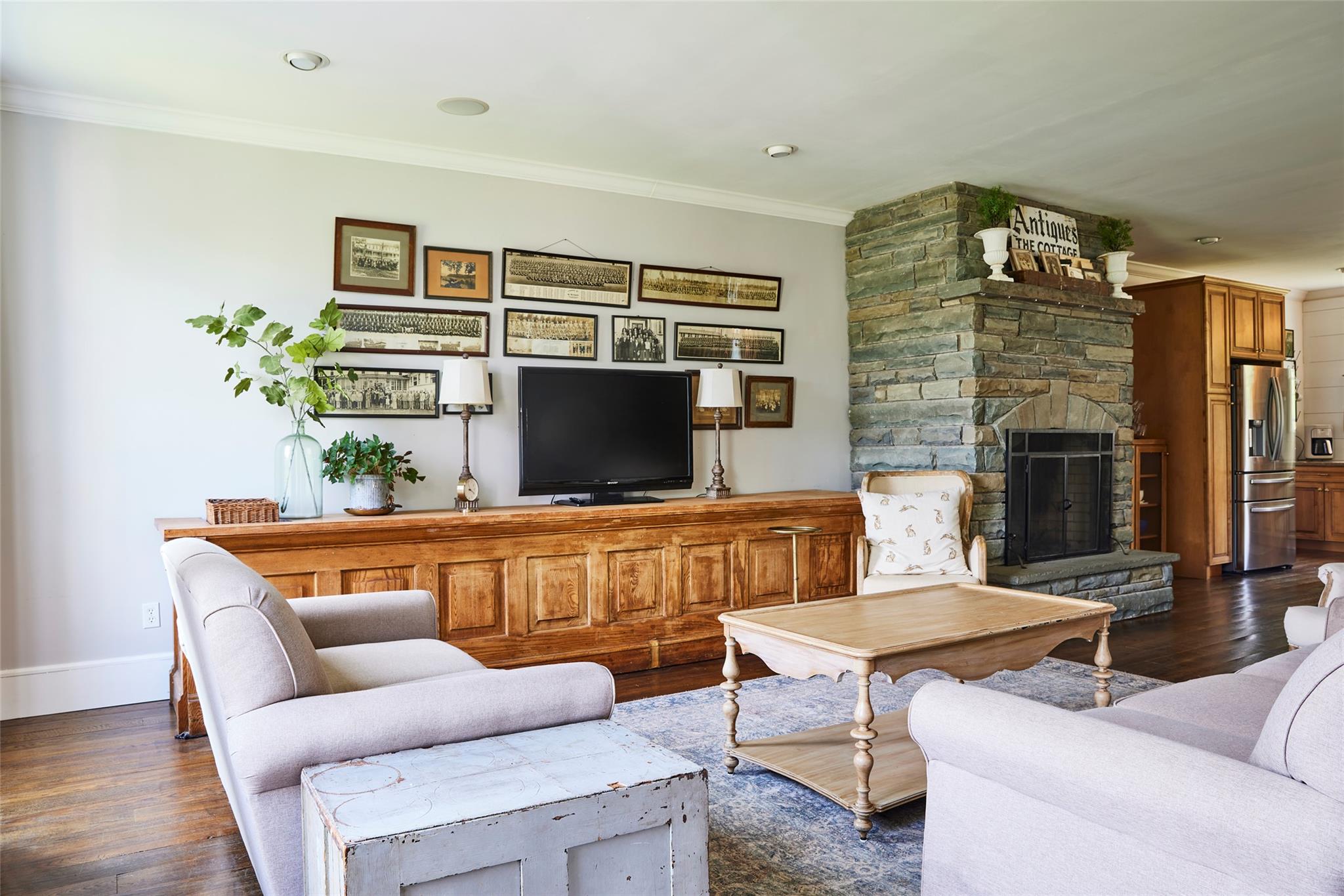 382 Benton Hollow Road Neversink, NY 12765 - Photo 7 of 50 a living room with furniture a flat screen tv and a fireplace