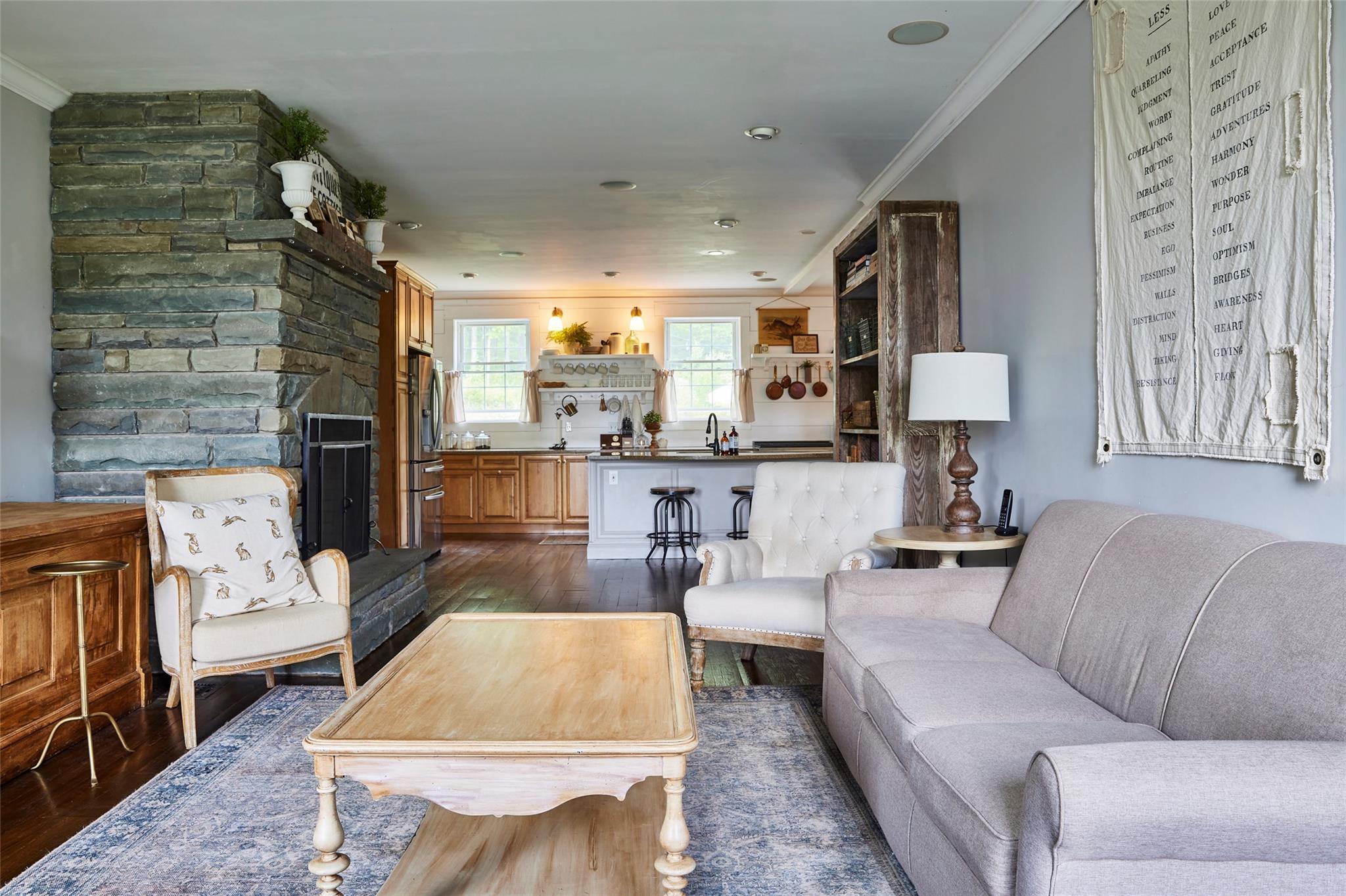 382 Benton Hollow Road Neversink, NY 12765 - Photo 8 of 50 a living room with furniture and a fireplace