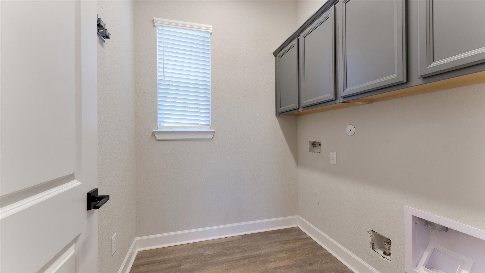 15607 Rising Wren Court Conroe, TX 77302 - Photo 14 of 40 a view of a closet area with wooden floor
