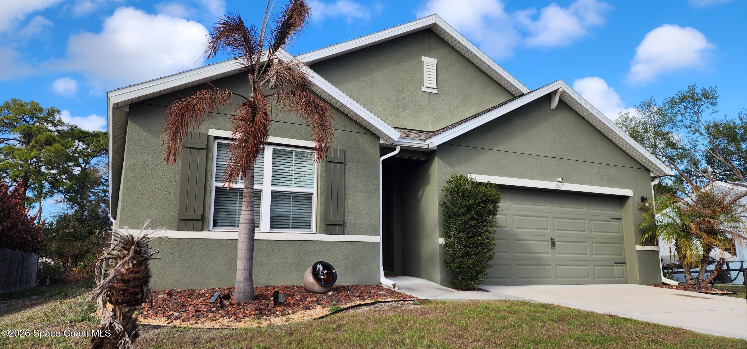 1661 Palatka Road Southeast Palm Bay, FL 32909 - Photo 2 of 7 3856