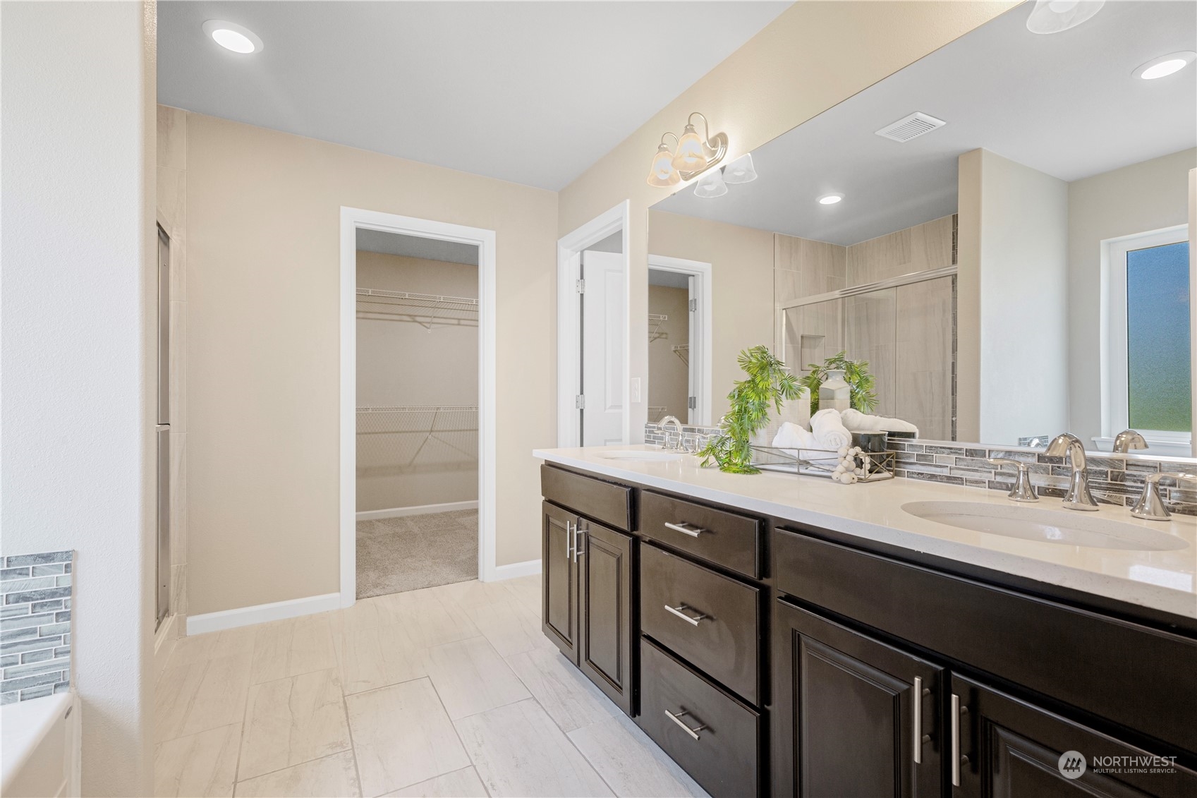 21311 42nd Avenue Southeast Bothell, WA 98021 - Photo 11 of 24 a spacious bathroom with a double vanity sink and mirror