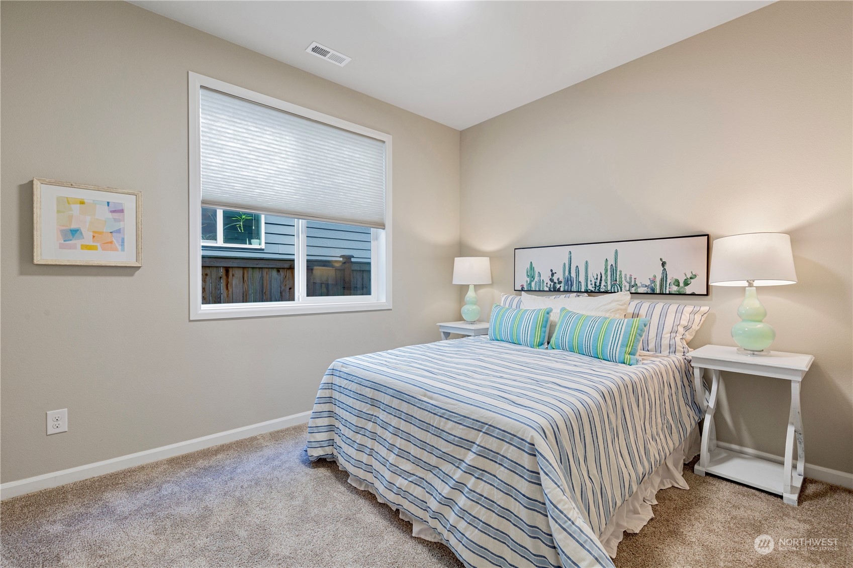 21311 42nd Avenue Southeast Bothell, WA 98021 - Photo 16 of 24 a bedroom with a bed and a window