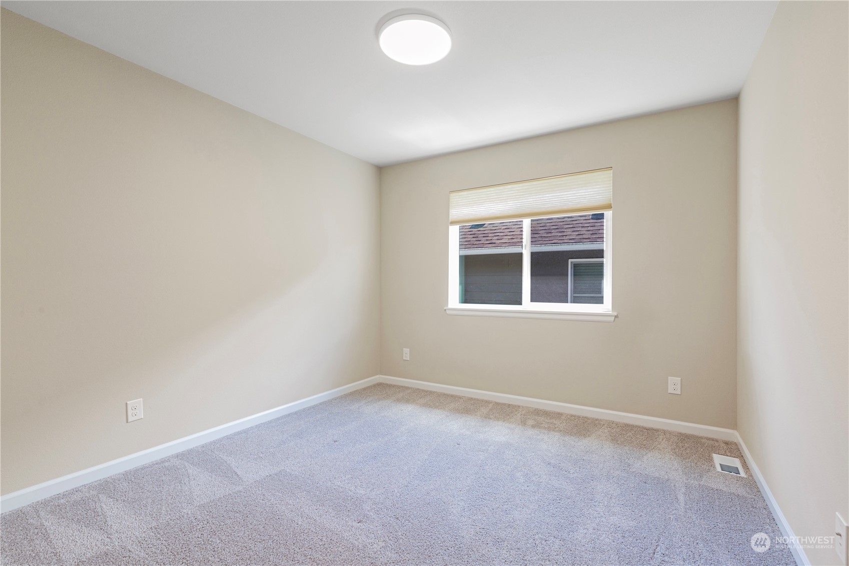 21311 42nd Avenue Southeast Bothell, WA 98021 - Photo 17 of 24 an empty room with a window