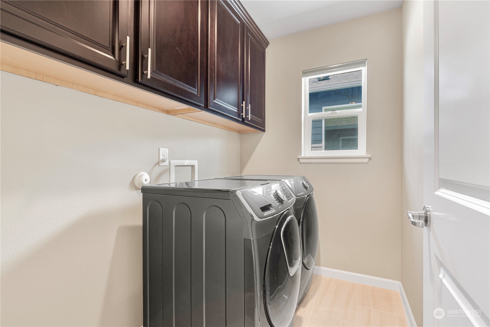 21311 42nd Avenue Southeast Bothell, WA 98021 - Photo 19 of 24 a utility room with dryer and washer