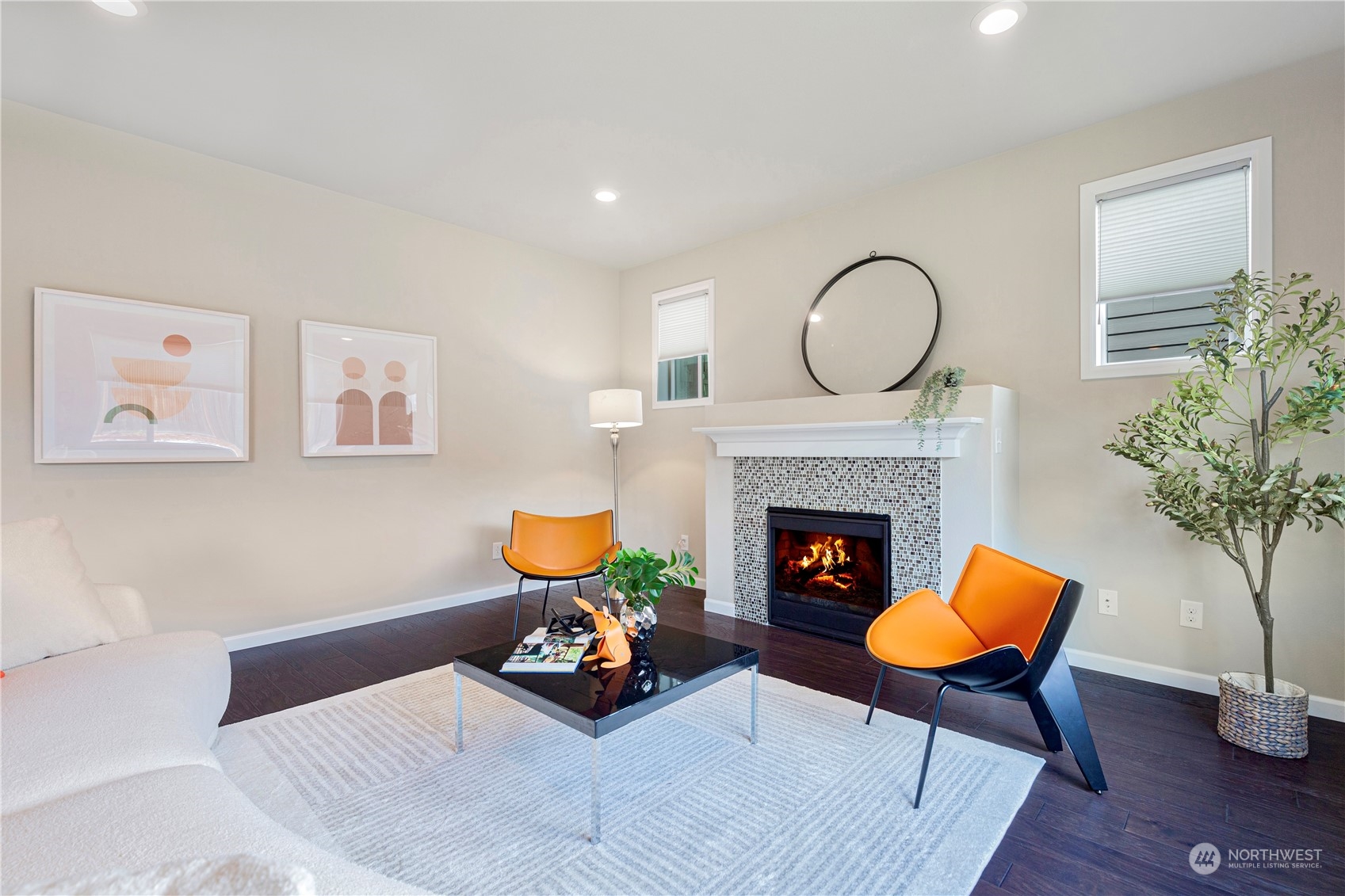 21311 42nd Avenue Southeast Bothell, WA 98021 - Photo 2 of 24 a living room with furniture and a fireplace