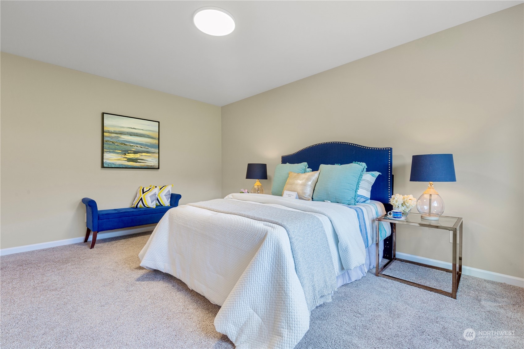 21311 42nd Avenue Southeast Bothell, WA 98021 - Photo 8 of 24 a bedroom with a bed and a lamp on table