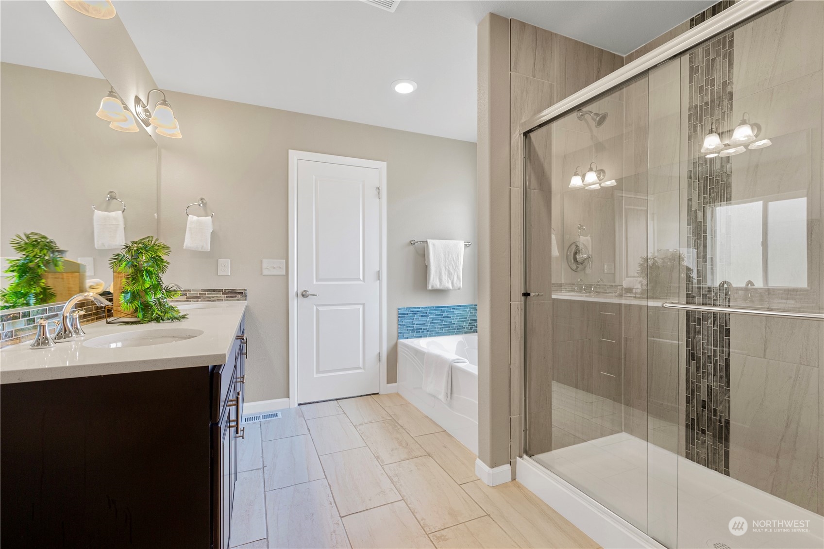 21311 42nd Avenue Southeast Bothell, WA 98021 - Photo 10 of 24 a bathroom with a sink and shower
