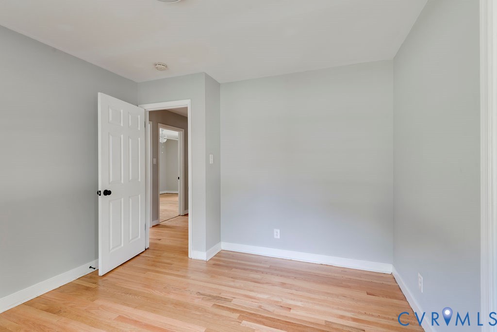 8510 Hunton Circle North Chesterfield, VA 23235 - Photo 15 of 32 a view of an empty room and wooden floor