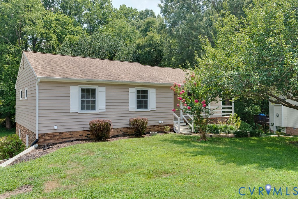 8510 Hunton Circle North Chesterfield, VA 23235 - Photo 2 of 32 a view of a house with a yard and sitting area
