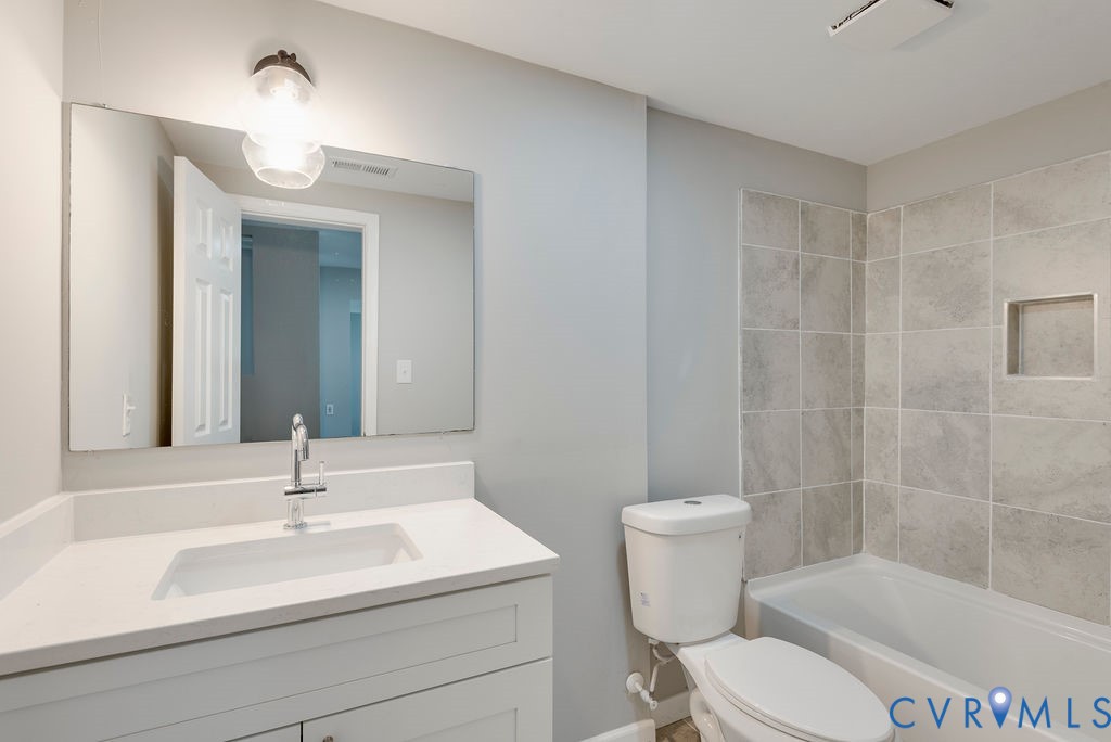 8510 Hunton Circle North Chesterfield, VA 23235 - Photo 21 of 32 a bathroom with a sink a toilet and shower